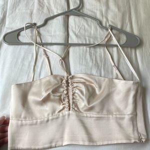 light cream color! very cute with shorts! just doesn’t fit my anymore